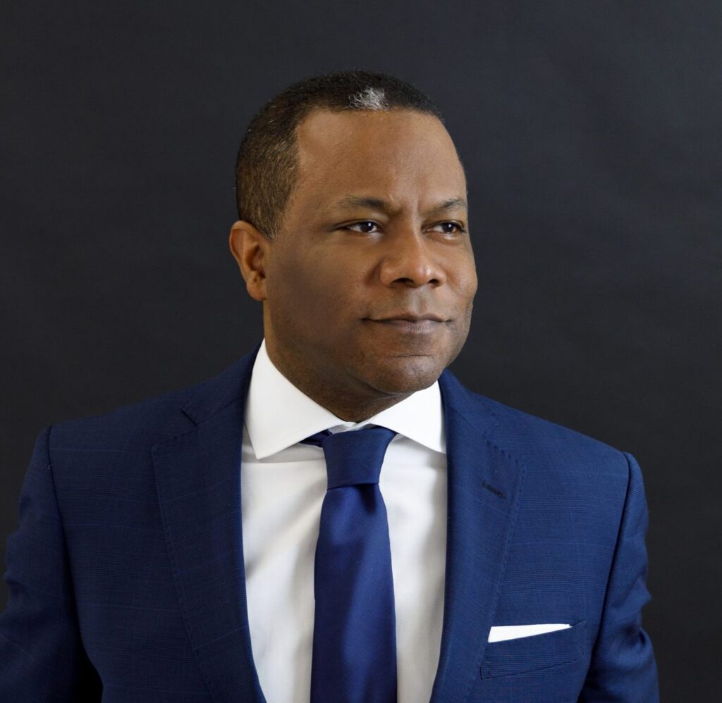 Ron Abad Headshot 1 scaled 1 e1766386719875